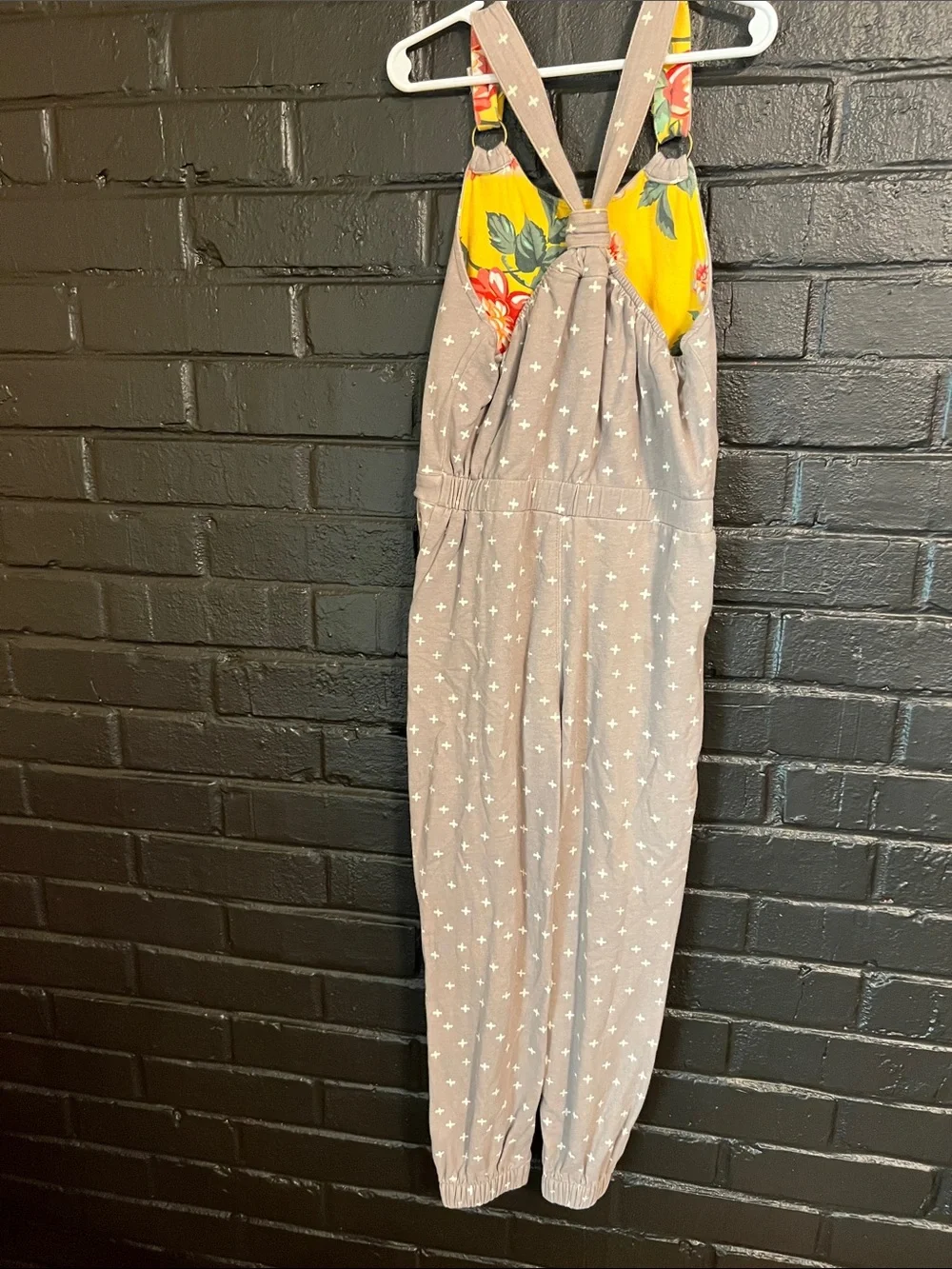 Matilda Jane Taupe One-Piece Overalls with White Cross Print and Yellow Straps